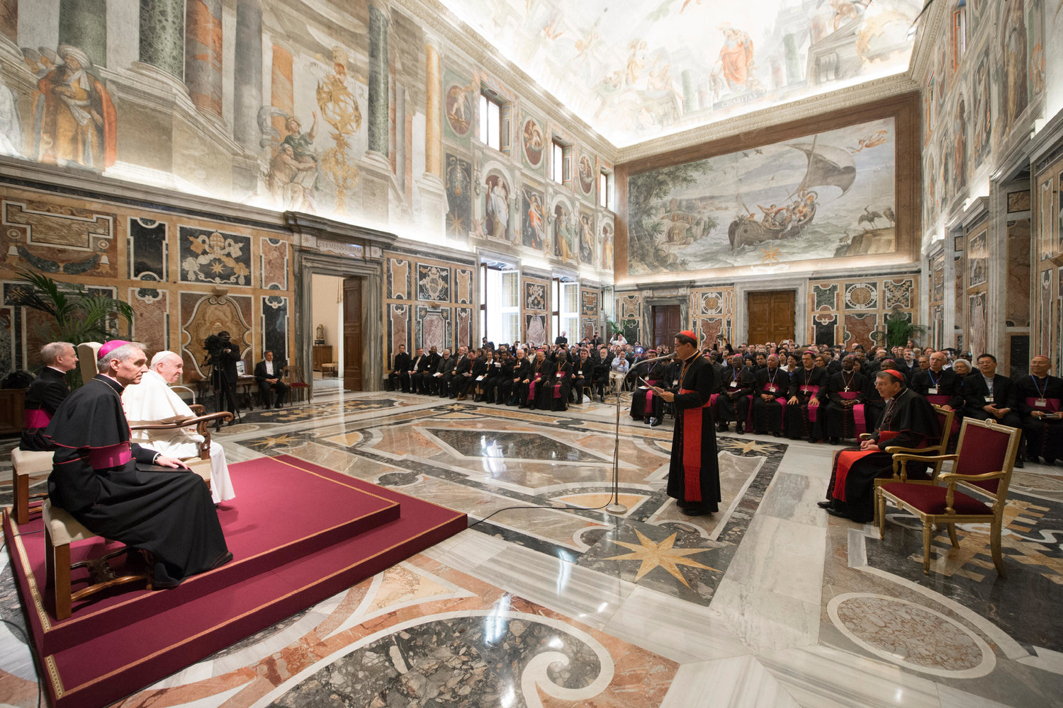 Pope Francis listens as Philippine Cardinal Luis Antonio Tagle of Manila, president of the Catholic Biblical Federation, speaks April 26, 2019, at the Vatican during a special audience marking the federation’s 50th anniversary. Seated to the Pope’s right is Archbishop Georg Ganswein, prefect of the papal household.